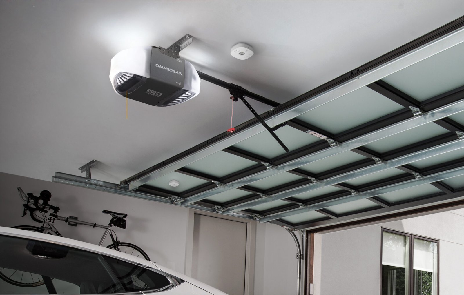 AL Garage Doors technician installing a smart belt-drive opener in Chicago